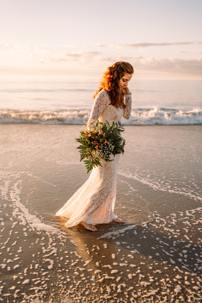 bride walking along the shore