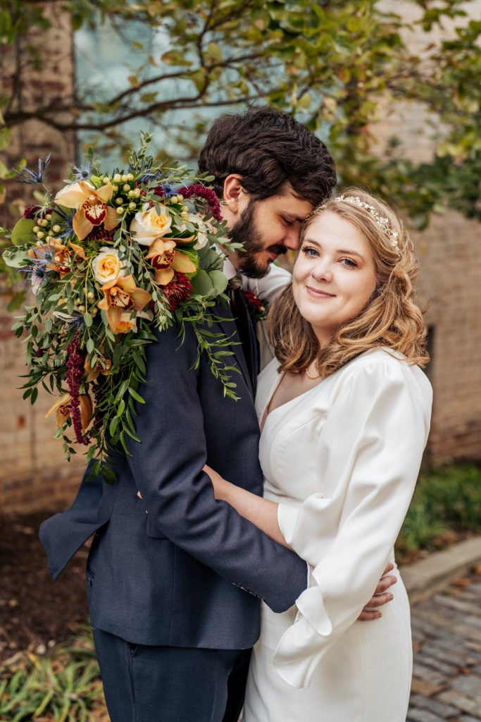 bride and groom portraits in alley Downtown Durham wedding