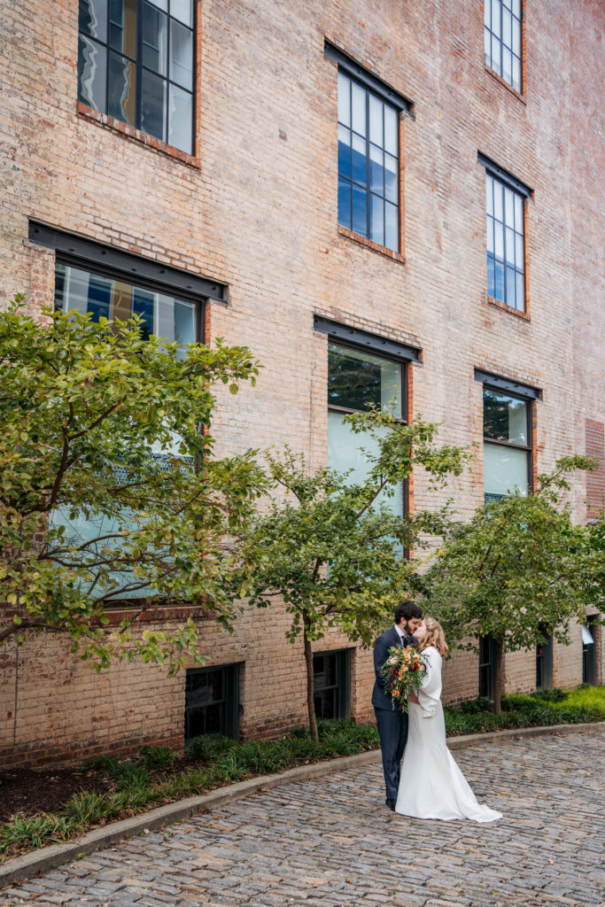 bride and groom portraits in alley Downtown Durham wedding