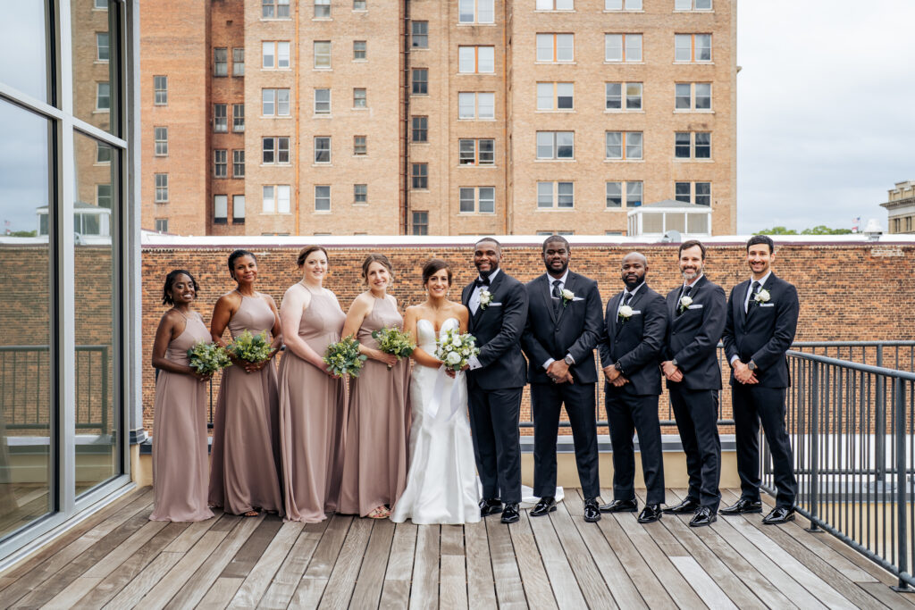 wedding party portraits on the deck of the Glass Box in downtown Raleigh