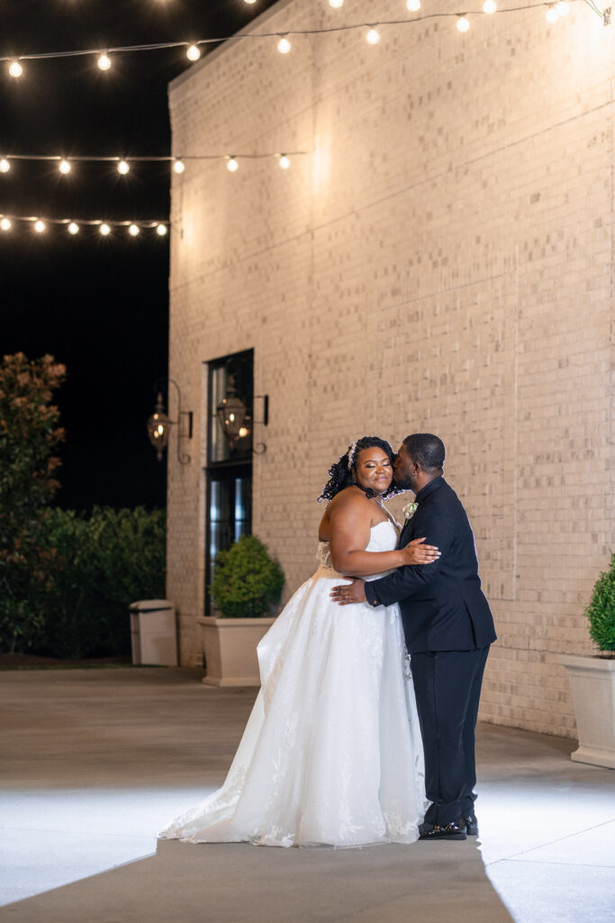 night portrait on the patio of the maxwell wedding venue 