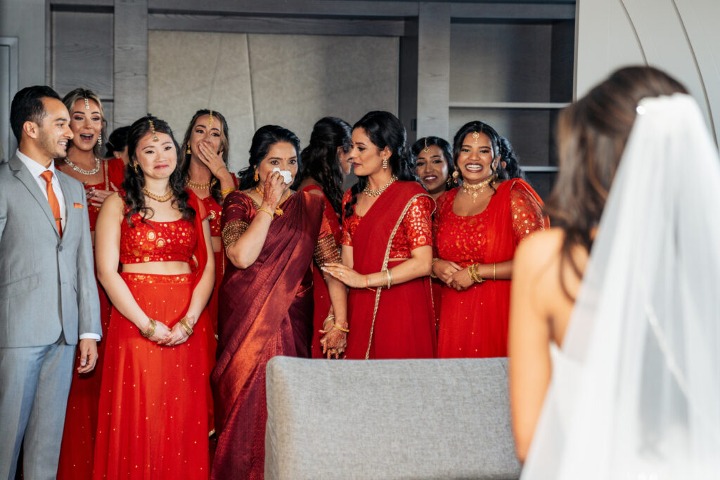 bride first reveal with bridesmaids at the Marriott Raleigh