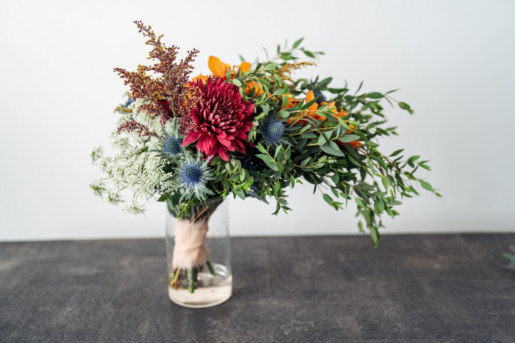 Fall color bouquet provided by Falling in Lovely Florals, a Raleigh wedding florist.