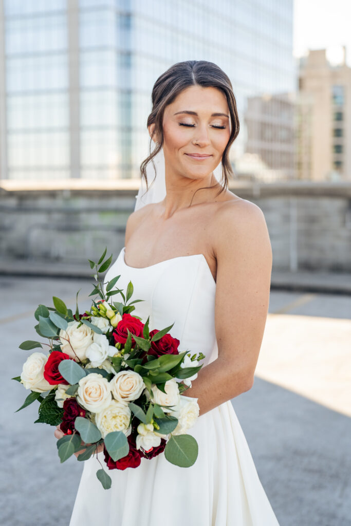 bridal portrait on top of parking deck in downtown Raleigh