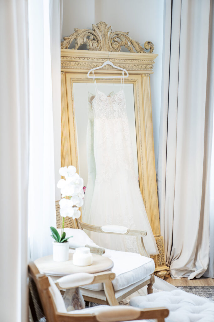 Dress hanging in bridal suite at wedding venue