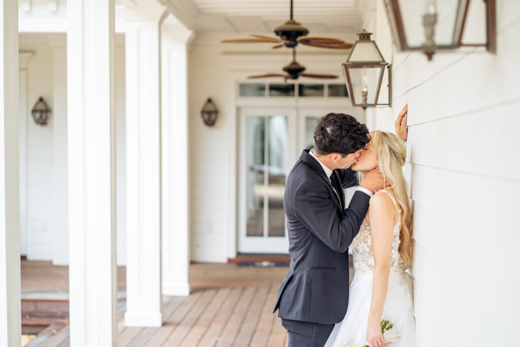 bride and groom kiss at Southern coastal wedding in Wilmington, NC