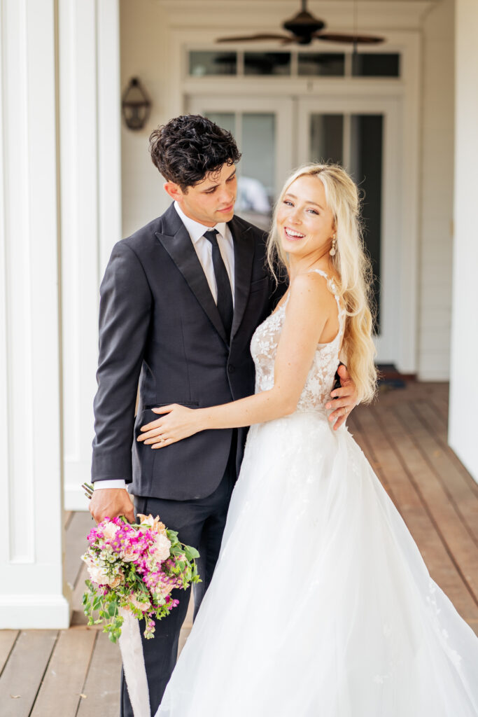 Bride and groom smiling