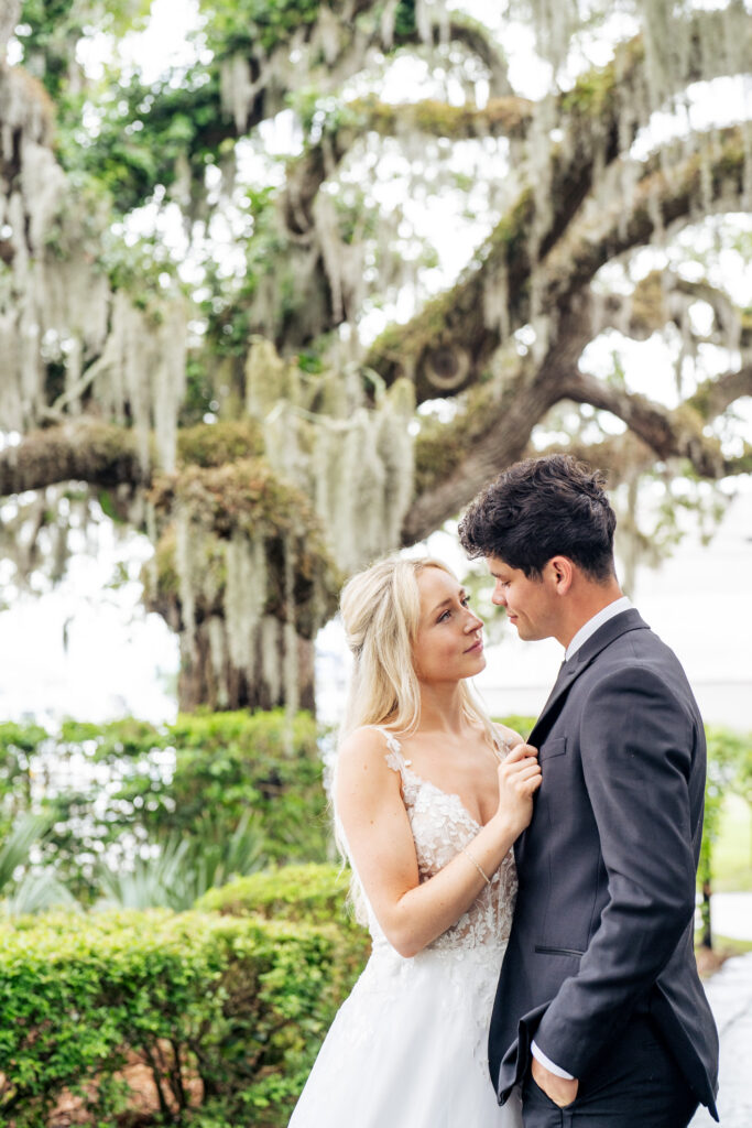 bride and groom portrait at southern coastal wedding under Spanish moss