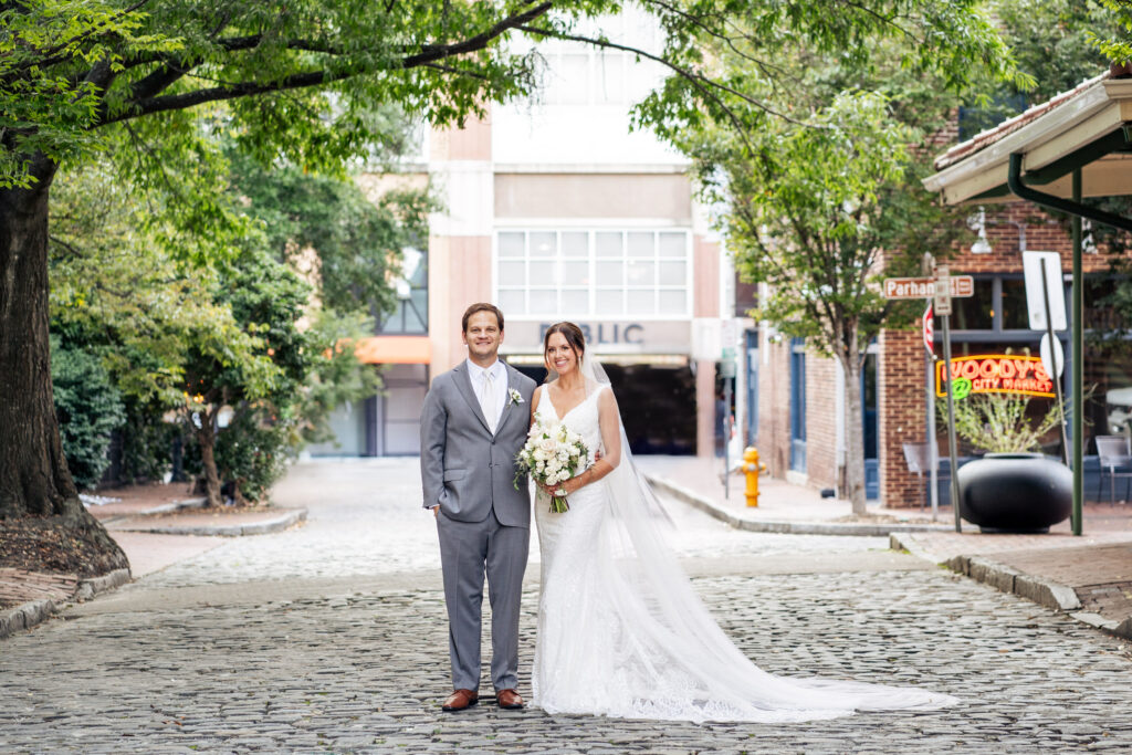 bride and groom portrait at City Market outside Historic Market Hall in downtown Raleigh