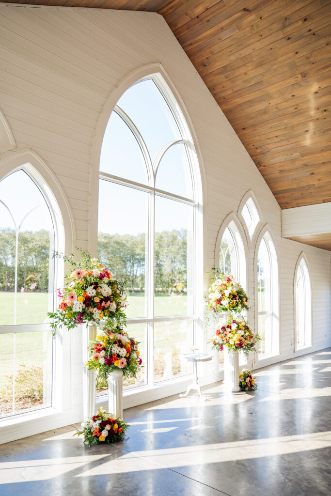 florals set at the chapel at Daniel's Ridge wedding venue in Sanford, NC