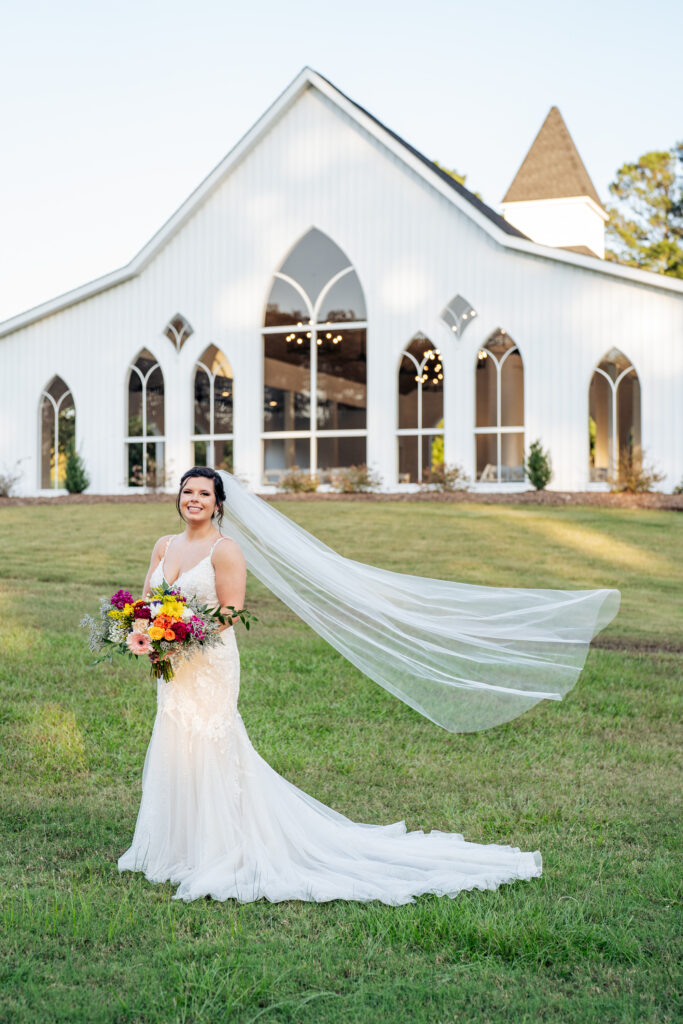 bridal portrait in front of chapel at Daniel's Rdige