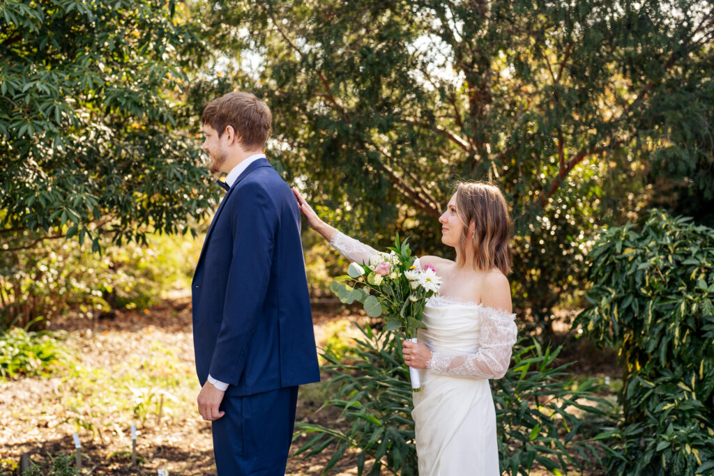 First look between bride and groom at JC Raulston Arboretum