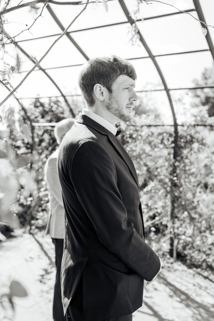 Groom sees bride walking down the aisle at JC Raulston Arboretum