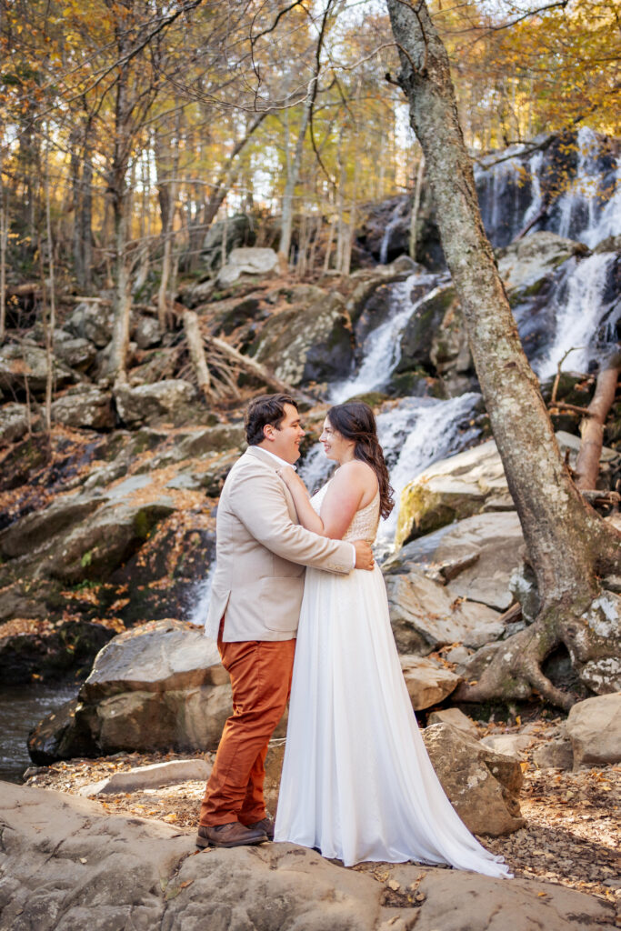 bride and groom in front of Dark Hollow Falls in Shenandoah National Park