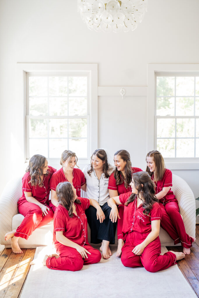 bride and bridesmaids in pajamas at bridal suite at the Barn of Chapel Hill