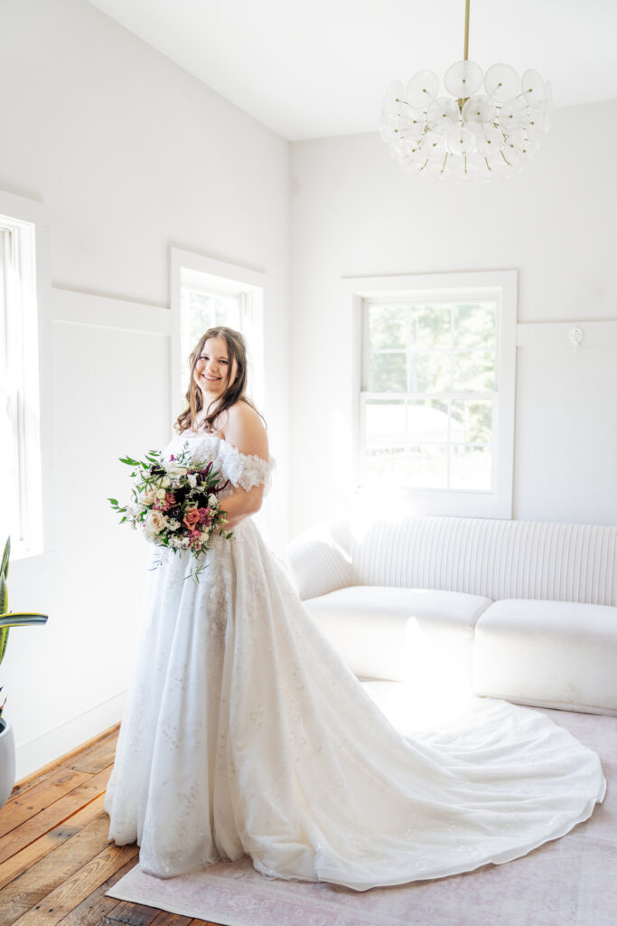 bride smiling in bridal suite at the Barn of Chapel Hill