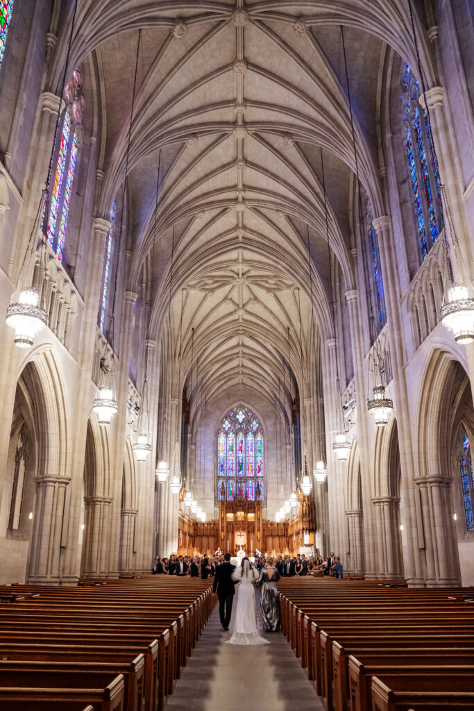 bride walking down the aisle at Duke Chapel wedding in Durham, NC