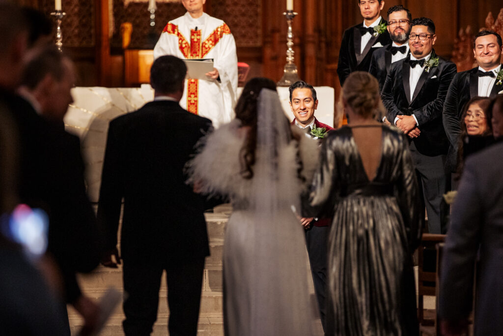 groom sees bride for first time at Duke Chapel wedding