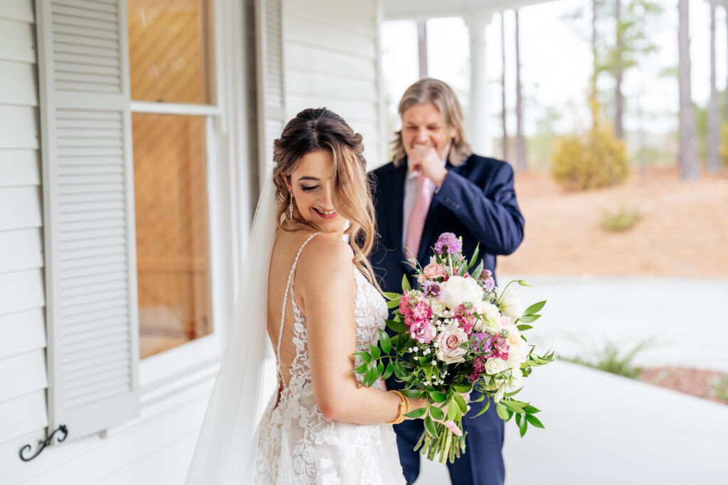 father daughter first look at the Upchurch wedding venue