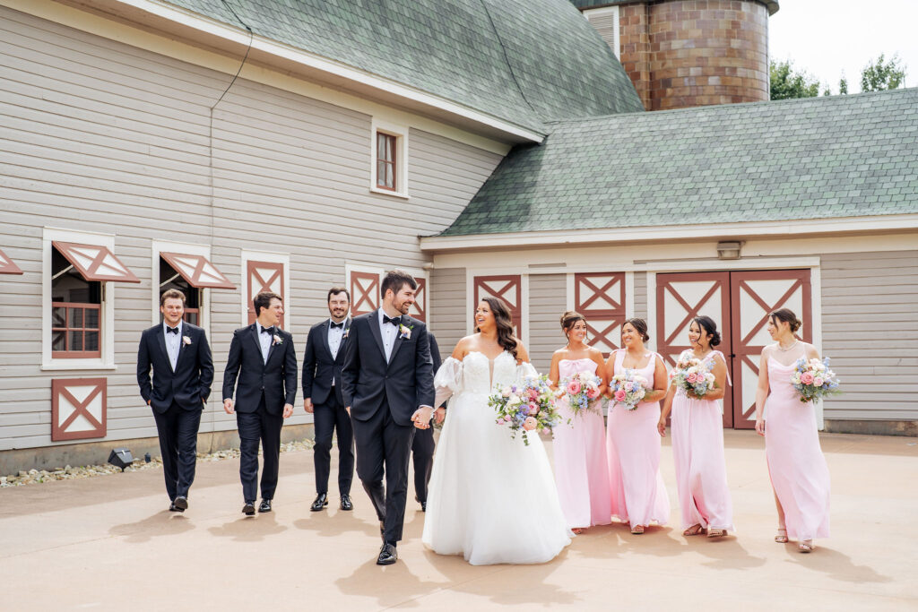 wedding party portrait at wakefield barn with by photography with mid-range wedding photography prices