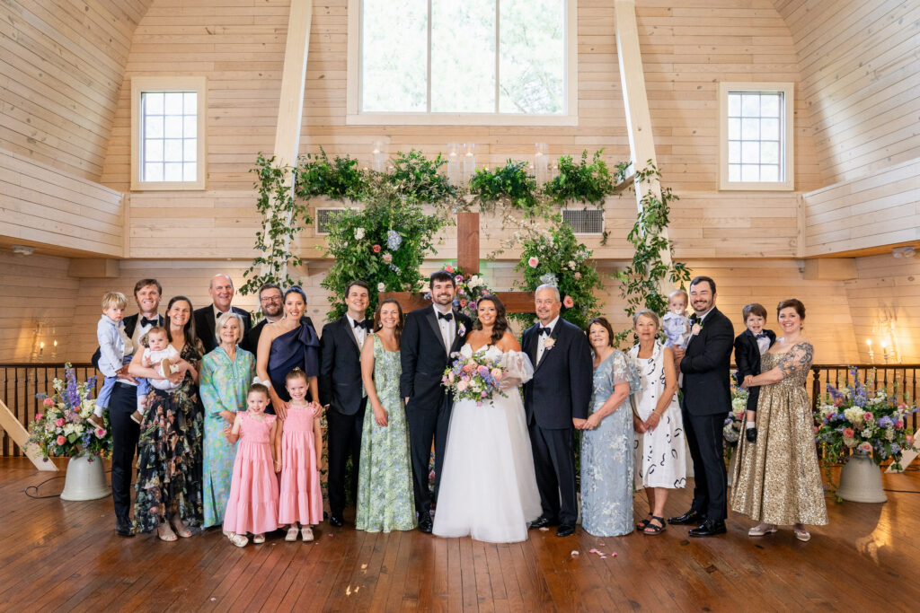 bride and groom and their family members at Historic Wakefield Barn wedding near Raleigh, NC